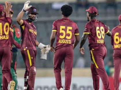 West Indies captain, Shai Hope (second left), celebrates the fall of a Bagladesh wicket during the second One-Day International cricket match at the Sher-e-Bangla National Stadium yesterday.