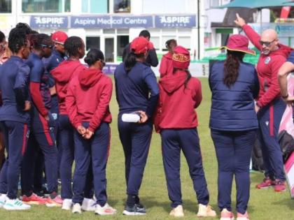 West Indies Women’s head coach, Shane Deitz (second right), gives instructions during a training session with players.