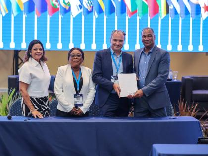 From left: Milaika Capella Ras, general manager of the CSA; Magda Milano, director of the Suriname Port Management Company; Nico Suys, SPTI manager – Port Projects; and William Brown, president of the CSA, following the signing of the memorandum of under
