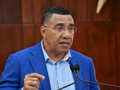 Prime Minister Dr Andrew Holness addresses a special Jamaica House press briefing, looking at preparations for Tropical Storm Melissa, in St Andrew yesterday.