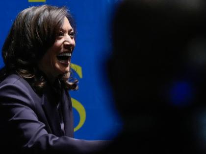 Former United States Vice President Kamala Harris greets people before she speaks on October 17, 2025, in Birmingham, Alabama. 