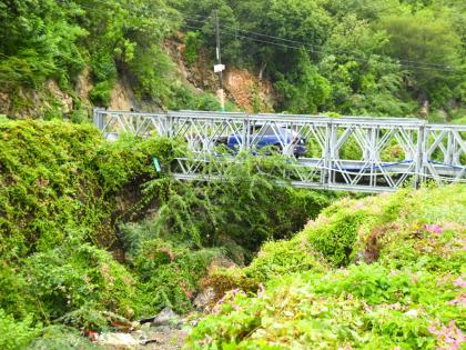 The gully and bridge above where flooding frequently occurs in the community of Taylor Land, St Andrew, where the ministry has requested residents to evacuate. 