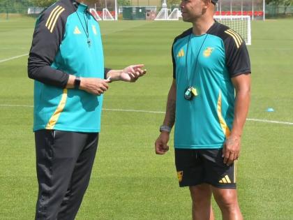From left: Reggae Girlz head coach Hubert Busby Jr and his assistant Deon Burton during a training session in Trinidad and Tobago. 
