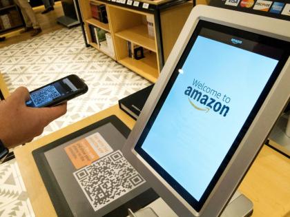 A shopper uses the Amazon app to pay for his purchase at the Amazon 4-star store in the Soho neighbourhood of New York, in this September 27, 2018 photo.