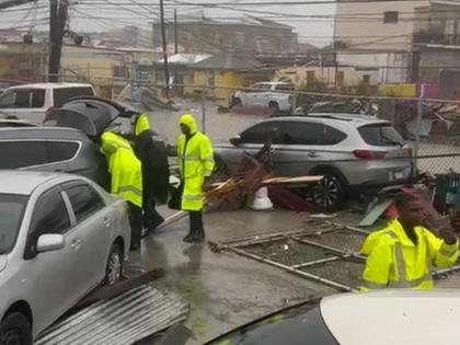 Police personnel at the Black River Police Station in St Elizabeth accessing damage to the station during the passage of Hurricane Melissa on October 28, 2025.