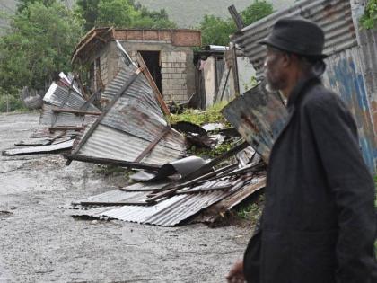 Zinc fence damaged by Hurricane Melissa in St Andrew.