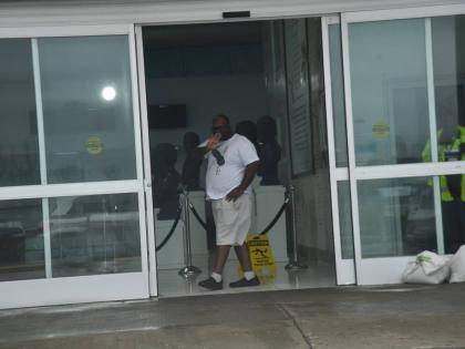 Workers at the Norman Manley International Airport during the passage of Hurricane Melissa on October 28, 2025.