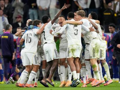 Real Madrid players celebrate after a La Liga match against Barcelona in Madrid, Spain, on Sunday.
