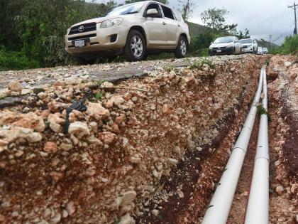 Damage to the Spur Tree main road in Manchester arising from Hurricane Melissa.