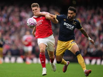 Arsenal’s Viktor Gyoekeres (left) and West Ham’s Lucas Paqueta challenge for the ball during the English Premier League match between Arsenal and West Ham United at the Emirates stadium in London, on October 4, 2025.