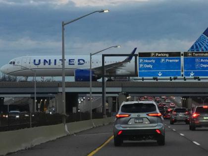 A United Airlines flight arrives at O'Hare International Airport in Chicago, Monday, November 3, 2025. (AP Photo/Nam Y. Huh)