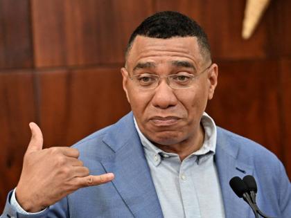 Prime Minister Dr Andrew Holness addressing yesterday’s special press briefing at Jamaica House in St Andrew. 