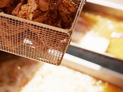 Golden-brown fried chicken was among the meal options that included curried chicken, curried fish, and a vegetable stew.