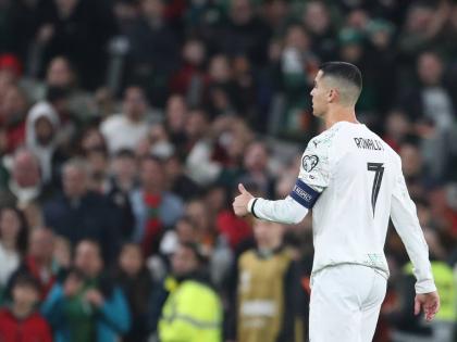Portugal’s Cristiano Ronaldo leaves the pitch after being shown a red card during a World Cup 2026 Group F qualifying football match between Ireland and Portugal in Dublin, Thursday, November 13, 2025. 