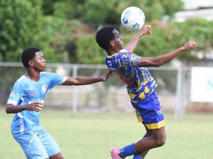 St Elizabeth Technical’s Deandre Barnett (right) 