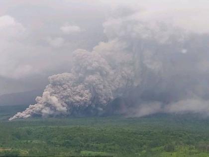 In this photo released by the Geological Agency (Badan Geologi) of Indonesia's Ministry of Energy and Mineral Resources, Mount Semeru releases volcanic materials during an eruption in Lumajang, East Java, Indonesia, Wednesday, November 19, 2025. (Badan Geo
