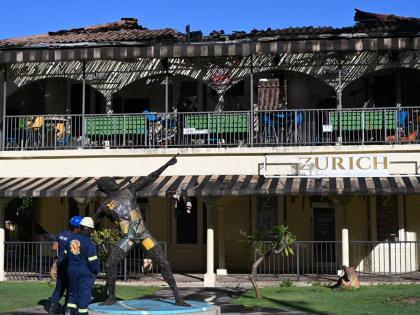 Firefighters at Usain Bolt’s Tracks & Records restaurant in Montego Bay, St James, following a blaze at the eatery on Saturday.