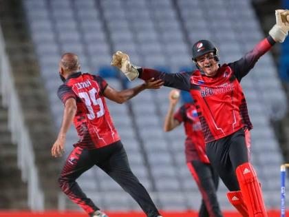 
The Trinidad and Tobago Red Force’s Yannic Cariah (left) celebrates one of the four wickets he took, inclusive of a hat trick against the Jamaica Scorpions at the Brian Lara Cricket Academy in Toruba on Friday. Celebrating with him is his captain, Joshu