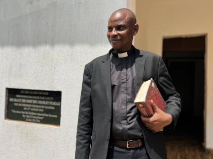 Rev. Robert Wantsala, vicar of a small Anglican parish in eastern Uganda, stands at the headquarters of the diocese in Mbale.