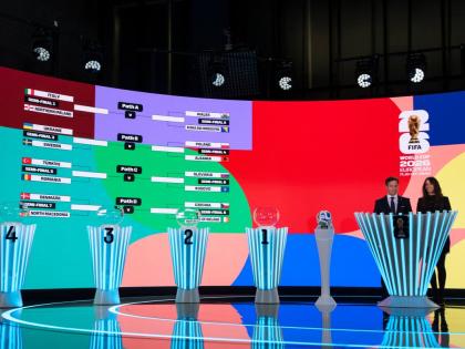 The UEFA Playoff tree is shown on a screen next to Manolo Zubiria (left), chief tournament officer for the FIFA World Cup 2026, and host Melanie Winiger, during the FIFA World Cup 2026 playoff draw in Zurich, Switzerland, on Thursday, November 20.