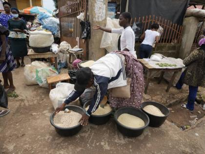 Women sell food items at a street market in Owo, Southwestern Nigeria.
