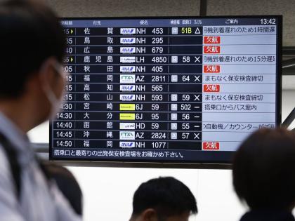 The departures display board shows All Nippon Airways' multipule flights cancellation at Haneda airport in Tokyo Saturday, November 29, 2025. (Takahiko Kanbara/Kyodo News via AP)
