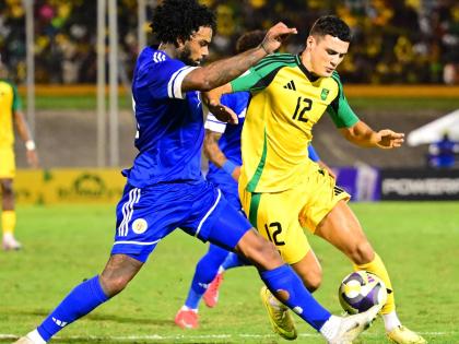 British-born Bailey Cadamarteri (right) in action for the Reggae Boyz against Curacao during a Concacaf World Cup qualifier at the National Stadium on Tuesday, November 18.