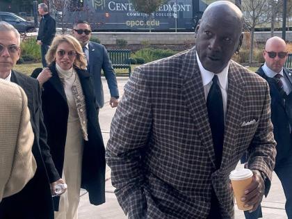 Michael Jordan arrives in the Western District of North Carolina yesterday for the start of the antitrust trial between 23XI Racing and Front Row Motorsports against NASCAR, in Charlotte, NC.