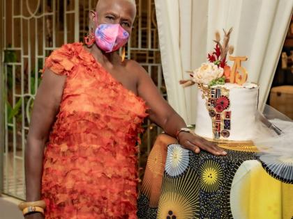 Surrounded by gratitude and love, Professor Emerita Carolyn Cooper shows out in a beautifully made one-shoulder maxi by Jamaican designer Elaine Witter for her 75th birthday.