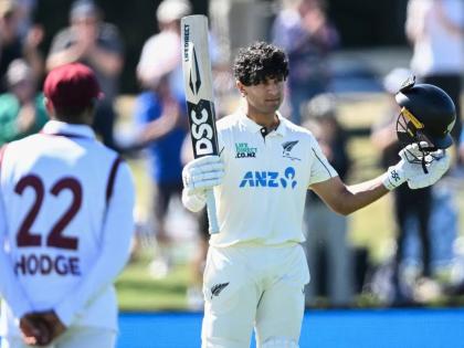 New Zealand’s Rachin Ravindra celebrates after reaching his century against the West Indies on day three of the first Test in Christchurch, New Zealand, on Thursday, December 4, 2025. 