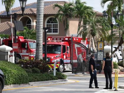 Emergency personnel from Coral Springs and Coconut Creek are on scene where a plane crashed in the Windsor Bay community in Coral Springs on Monday, November 10, 2025. (Carline Jean/South Florida Sun-Sentinel via AP)