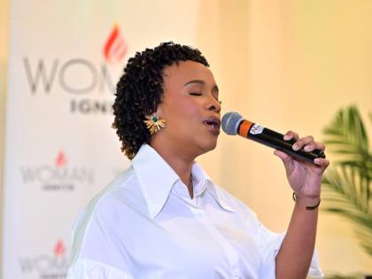 Left: Gospel worshipper Christina Broderick performs at the Woman Ignite Success Summit media launch held at the Courtleigh Hotel and Suites in St Andrew on Thursday,  November 27. 