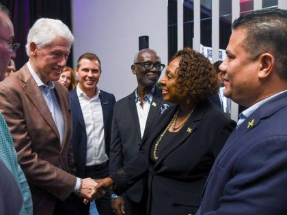 Minister Olivia Grange, who is charge of the Jamaican Government, meets with former United States President Bill Clinton in St Andrew on December 4, 2025 to discuss potential partnership with the Clinton Foundation in support of Hurricane Melissa recovery 