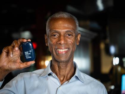 Photos by Gladstone Taylor/Multimedia Photo Editor 
Apostle co-founder and make-up master Jamie Melbourne proudly displays the Reclaim Tinted Moisturiser during a sit- down with ‘Sunday Lifestyle’ at Mingles Bar and Lounge.