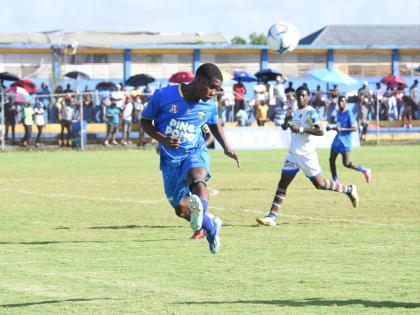
Clarendon College’s Roshaun Sterling heads a ball during his team’s ISSA daCosta Cup quarterfinal against St Elizabeth Technical High School at the STETHS Sports Complex yesterday. The game ended 1-1.