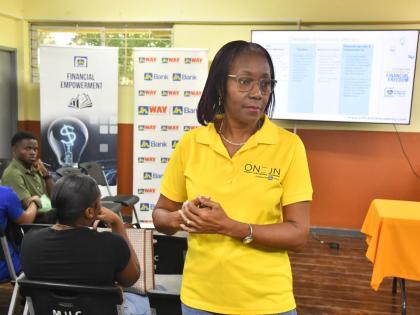 Rose Miller, financial education consultant with the JN Foundation, addressing students at The Mico University College.