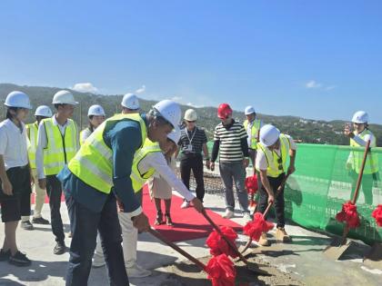 Prime Minister Dr Andrew Holness and LCH Development executives pour concrete, topping out Tower One at The Pinnacle development in Montego Bay, St James on December 10, 2025.