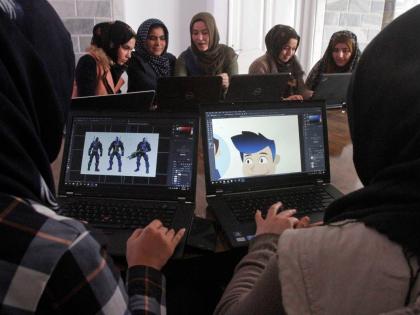 
In this January 22, 2018 photo, Afghan coders practise at the Code to Inspire computer training centre in Herat province, western Afghanistan.
