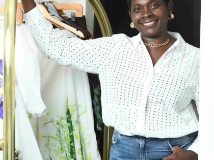 Ahead of the ‘Living’ photo shoot to spotlight her capsule collection, on which she collaborated with visual artist Tobean Walters, fashion designer Angella Wilkinson flashed her pearly whites.