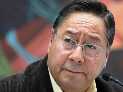 Bolivia's former President Luis Arce listens to questions during a press conference at the presidential palace in La Paz, Bolivia, August 21, 2025. (AP Photo/Juan Karita, File)