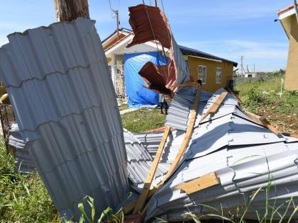Roofing of houses blown off by Hurricane Melissa are seen in Union Acres, Montego Bay, St James.