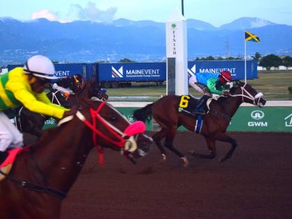 ANOTHER ONE (right) ridden by Dane Nelson wins the Charles Hussey OD Trophy race over five furlongs straight by a nose from COMMANDER Z (Ian Spence)  at Caymanas Park yesterday.