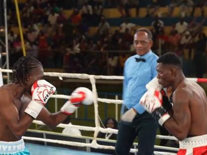 Danieel Hylton (left) and Damar ‘Force’ Haslam square off against each other during the final Wray and Nephew Fight Nights of the year at the Constant Spring Sports Complex on Saturday.