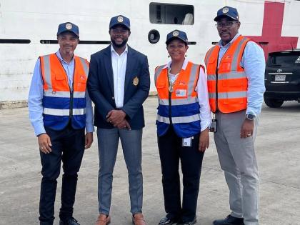 JFS Chief Executive Officer Anna Hamilton is joined on the Montego Bay Cruise Ship Pier by Chris Magnus, COSCO Shipping Line Manager (left), Mayor of Montego Bay Richard Vernon (second left), and Garth Letts, Operations Manager at JFS (right), during the a