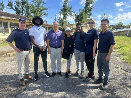 From left: Richard Forward, team lead for Global Medic; Orane Gardner, regional physical activity specialist for the Western Regional Health Authority; Pan Caribbean CEO Hanqiao Su; Rosa Young, Wavz Beach owner; Kimberly Grey, Pan-Caribbean legal consultan