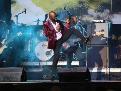 Richie Stephens sings ‘Trapped’ during the Official Celebration for Jimmy Cliff, held on Wednesday, December 17 at the National Indoor Sports Centre in Kingston.