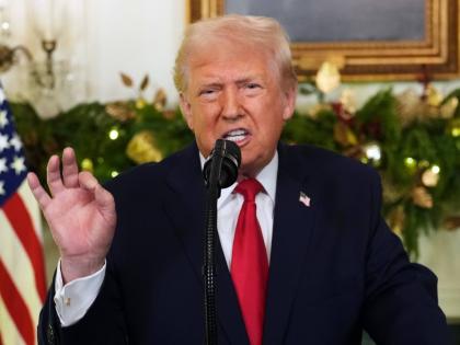 President Donald Trump speaks during an address to the nation from the Diplomatic Reception Room at the White House.