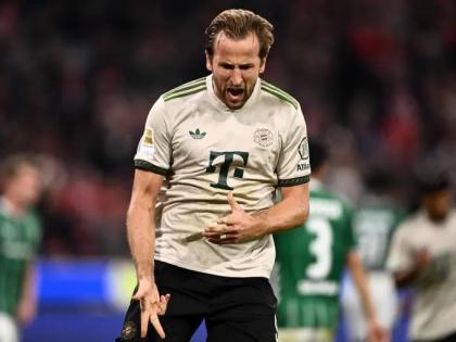 Bayern’s Harry Kane celebrates scoring from the penalty spot during the Bundesliga match between Bayern Munich and Werder Bremen at the Allianz Arena in Munich, Germany, on September 26.