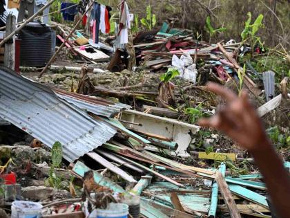 Mangled remains of a house in Westmoreland flattened by Hurricane Melissa.