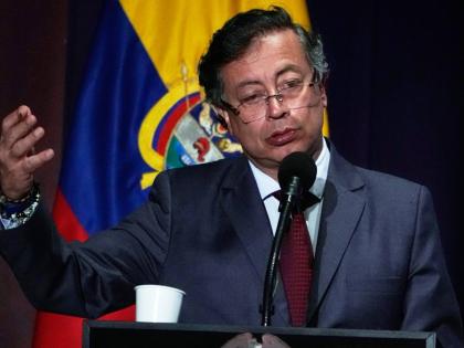 Colombia's President Gustavo Petro speaks at a ceremony marking the ninth anniversary of the signing of a peace deal between the state and the Revolutionary Armed Forces of Colombia (FARC), in Bogota, Colombia, Wednesday, November 26, 2025. (AP Photo/Ferna